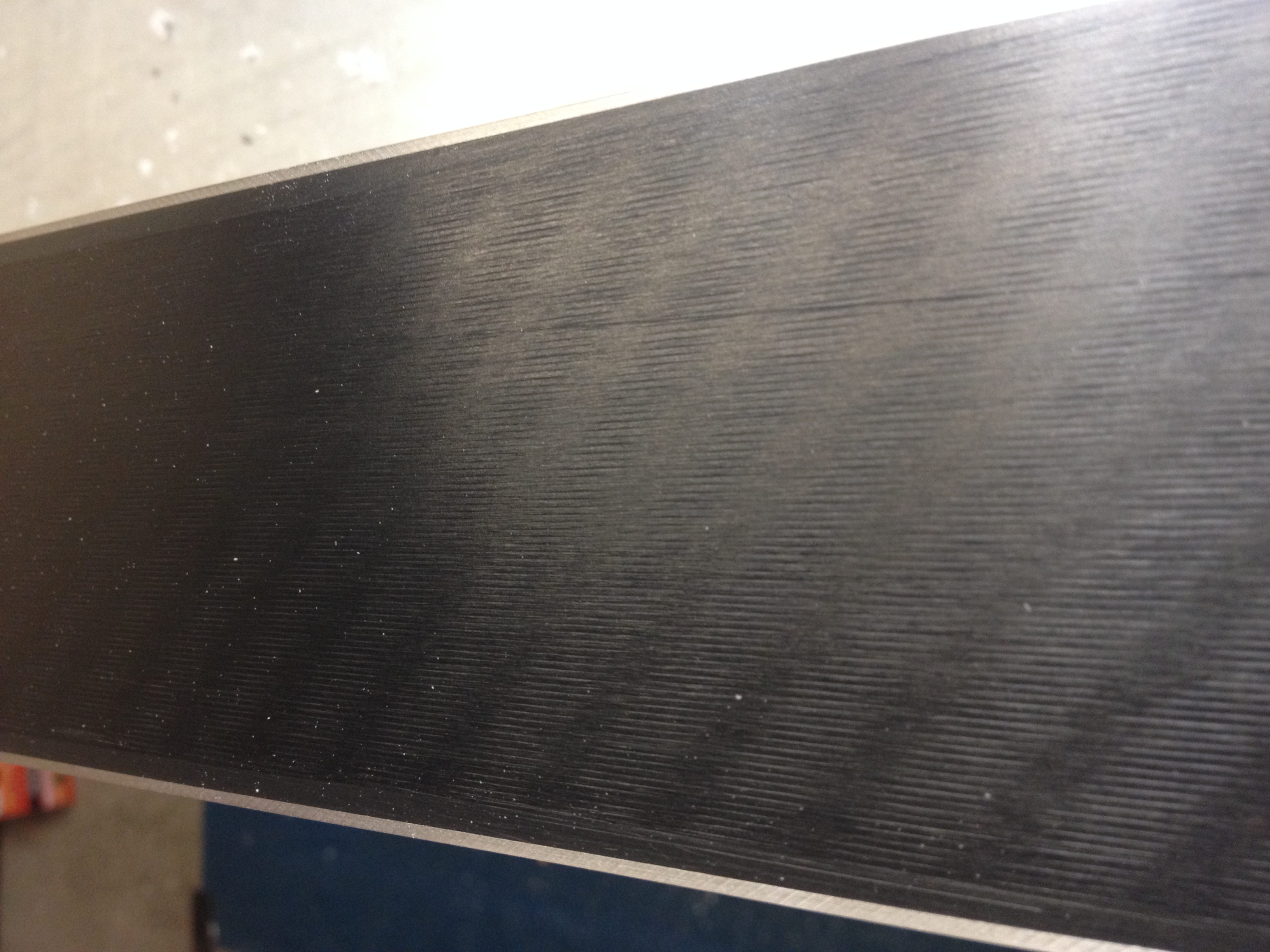 View of the base after it has been waxed and brushed. Notice the visible grind and glossy finish on the base. If the grind is not clear and the base is matte in colour, the base is damaged and needs to be brought in for a grind.