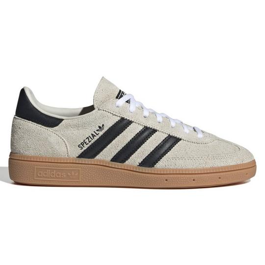adidas Originals suede sneakers in a tan/off-white colourway with contrast black details at the heel and serrated 3-Stripes with "SPEZIAL" and trefoil detail; white laces on top and a brown gum rubber outsole