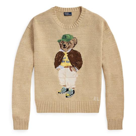 tan-coloured knit sweater from Polo Ralph Lauren with a crew neckline, long sleeves, ribbed trim at the cuffs and hem; jacquard knit Polo Bear graphic front and centre