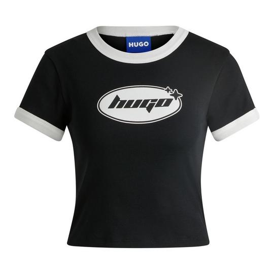 women's black ringer-style t-shirt from HUGO Boss with short sleeves and a straight hemline; contrast white trim at the crew neckline and sleeves; contrast white printed graphic at the chest with an "HUGO" lettering inside an oval with 2 small retro-style stars to the top-right side; follows back to school fashion trends